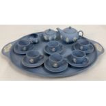 A Wedgwood blue & white jasper ware miniature 6 setting tea set on a 2 handled tray. Tray approx.