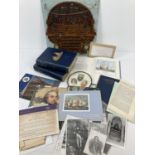A collection of mixed items relating to Admiral Nelson. A fretwork wooden plaque, a circular picture