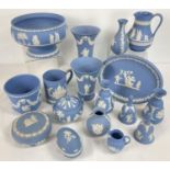 A collection of 17 items of Wedgwood blue and white jasperware ceramics. To include: pairs of vases,