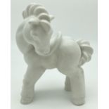 A vintage Rorstrand Swedish ceramic horse figurine by Gunnar Nylund in plain white glazed finish.