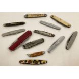 A collection of 12 vintage and modern penknives to include engine turned and marble effect