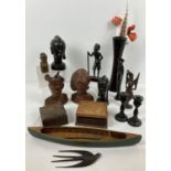 A collection of wooden items in varying woods. To include oriental and ethic carved figure, a