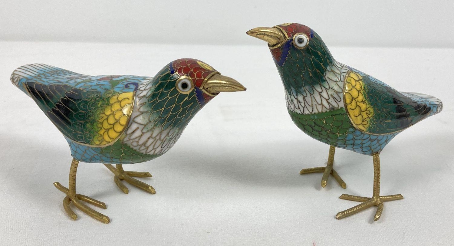 A pair of multi coloured Cloisonné bird figures with gold tone beaks and feet. Approx. 8cm tall.