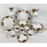 A quantity of Royal Albert first quality "Old Country Roses" tea and dinner ware. Comprising: