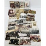 Approx. 70 assorted Edwardian & vintage postcards relating to military, naval & trains.