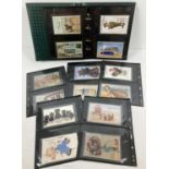 An album containing 36 vintage lift flap novelty souvenir postcards.