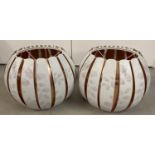 A pair of modern copper and white patterned metal globe style ceiling light shades. Approx. 30cm