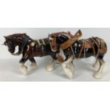 2 large Staffordshire ceramic shire horse figurines decorated with leather effect livery. Each