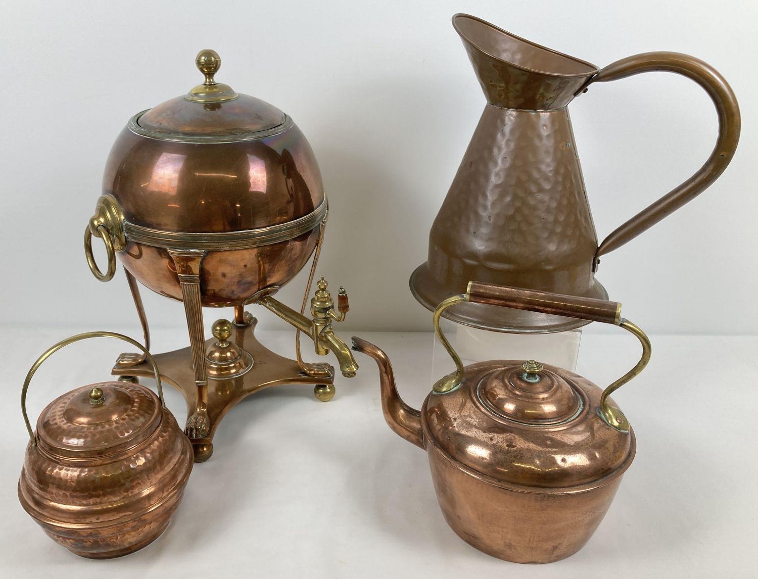 A heavy brass and copper Samovar together with a copper kettle, copper ale jug and a copper and