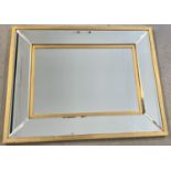 A large heavy, modern gilt framed sectional mirror with bevel edged glass panels. Approx. 85cm x