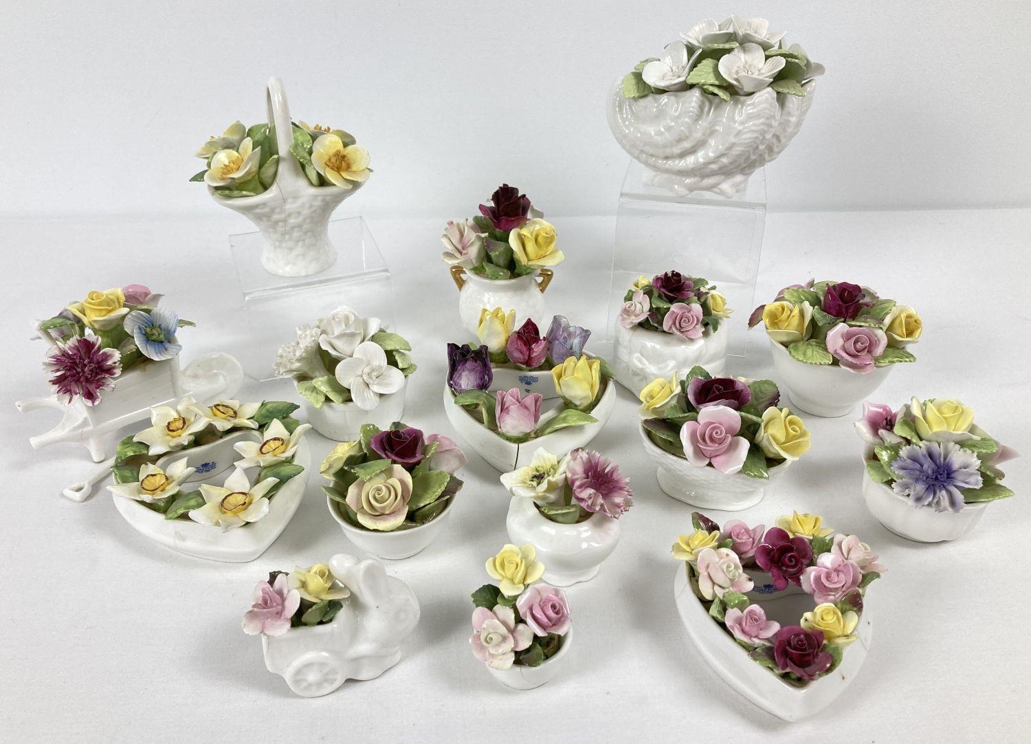 A quantity of assorted Coalport ceramic floral bud vases and ornaments. Some a/f.