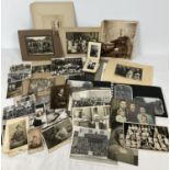 A collection of antique and vintage photographs to include Victorian and Edwardian portraits and