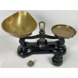 A vintage set of Libra Scale Co kitchen scales. Complete with brass bowls and weights.