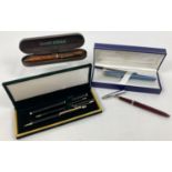 A collection of vintage and modern pens and pencils. Comprising a vintage Waterman's Ideal