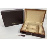 A new and boxed red Birdseye maple jewellery box by Walwood. Cream velveteen lining with ring/