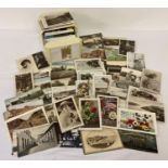 A vintage plastic card draw containing 200+ Edwardian and vintage postcards and greetings cards.