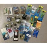 A box of assorted fishing accessories, mostly new in original packets. To include sea lead