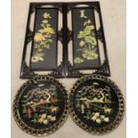 2 oriental wooden wall hanging plaques with pierced work frames and lily pad and chrysanthemum