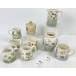 A collection of 9 pieces of modern Jenny Bell, hand painted ceramics. With designs inspired by the