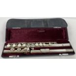 A Jupiter silver tone flute complete with original velvet lined case. Also comes with zip-up carry