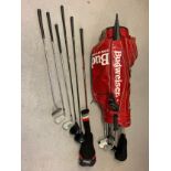 A red leather Budweiser golf club bag with carry handle and strap together with a collection of