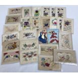A collection of 25 Edwardian embroidered silk sweetheart & greetings postcards.