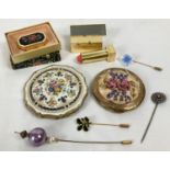 A collection of ladies vintage vanity items to include lucite topped compact from Melissa. Lot