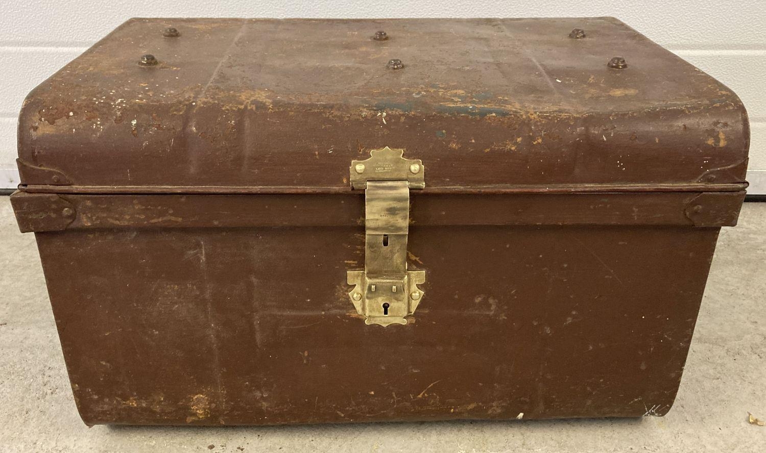 A Victorian tin trunk with original brass catch and lock and studded detail to lid. Approx. 37 x