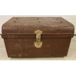 A Victorian tin trunk with original brass catch and lock and studded detail to lid. Approx. 37 x
