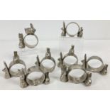 A set of 8 modern heavy silver plated napkin rings with rabbit detail.