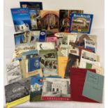 A box of assorted vintage ephemera, mostly souvenir tourist brochures, guide books, maps and