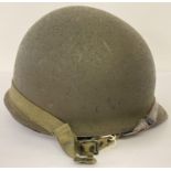 Original US M1C WW2 Paratrooper helmet - 1944 specification, rear join. Complete with helmet