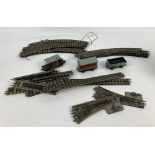 A small collection of vintage Hornby Dublo/Meccano tinplate railway track together with 3 tinplate