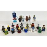 A collection of 22 assorted Lego figures plus 1 play piece. To include Star Wars and Ninjago figures