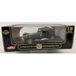 A boxed diecast 1:18 scale Lotus Caterham Super Seven 1957-1973, on named plinth, by Anson.