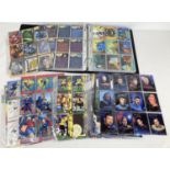 An album containing sets of trading cards. Comprising: Panini Bundesliga 96, Star Trek Masters