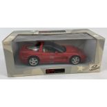 A boxed UT models diecast 1:18 scale UT0597 red Chevrolet.