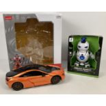 2 modern boxed robot toys. A 1/14 scale Rastar Transformable car together with an unopened Dance