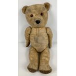 A vintage 1960's Chiltern "Hugmee" bear with plastic dog nose. Approx. 16" long. With worn blonde