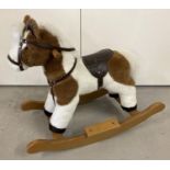 A Mulholland & Bailie plush toy rocking horse with wooden rockers and feet supports. With