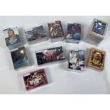 10 assorted complete sets of trading cards to include DC comics & Babylon 5. Lot comprises: The X