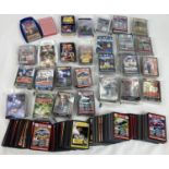 A box of assorted trading cards and card games to include Top Trumps. Box includes a large