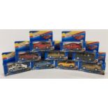 9 boxed Super Racer Pull Back and Go Action diecast vehicles. To include police car, sports cars