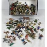 A shoe box of assorted vintage plastic toy soldiers, cowboys, knights & animals. To include Lone
