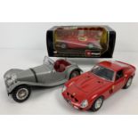 3 x 1:18 scale diecast cars by Burago. A boxed Jaguar XK120 Roadster, an unboxed Jaguar SS 100 and