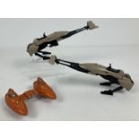 A 1980 Kenner Toys Twin Pod Cloud Car with brown plastic landing feet and fixed pilots. Together