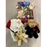 A collection of vintage and modern soft toys. To include teddy's, elephants, rabbit and dogs.