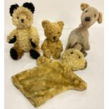4 smaller sized vintage soft toys to include a wind up musical kangaroo and a bear hand puppet.