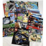A quantity of assorted Lego instruction manuals, leaflets and posters. To include: Star Wars,