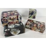 4 assorted boxes decorated with comic book decoupage detail. Largest approx. 11.5 x 14 x 21cm.